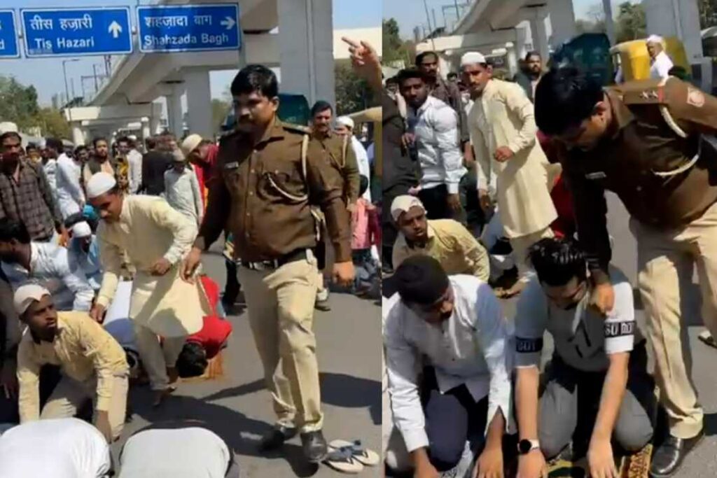delhi cop hits a person while offering namaz in inderlok 